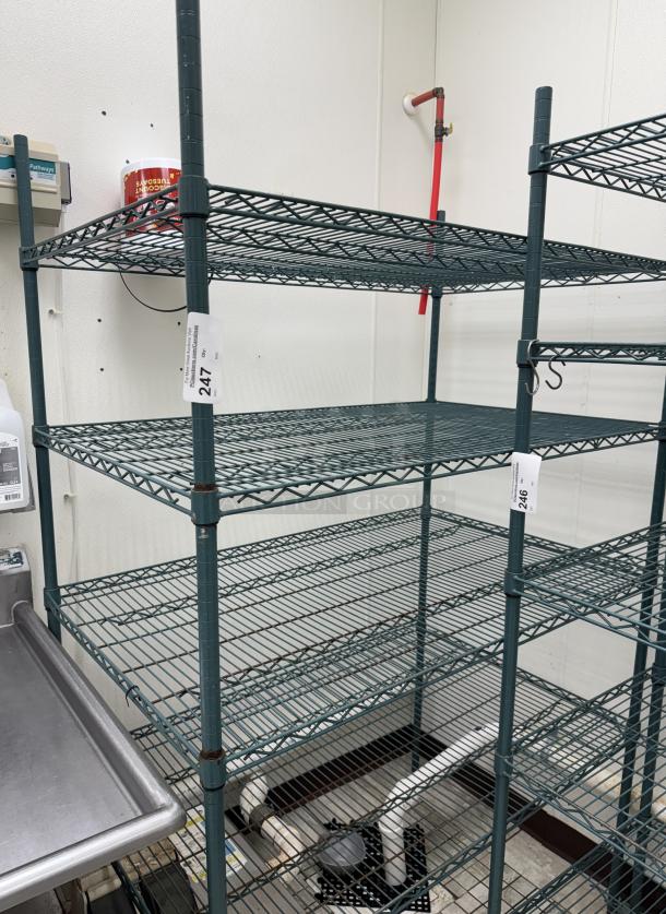 Metal wire rack with 4 shelves, green finish, good condition, numbered tags "247" and "246" visible, ideal for storage.
