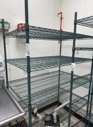 Metal wire rack with 4 shelves, green finish, good condition, numbered tags "247" and "246" visible, ideal for storage.