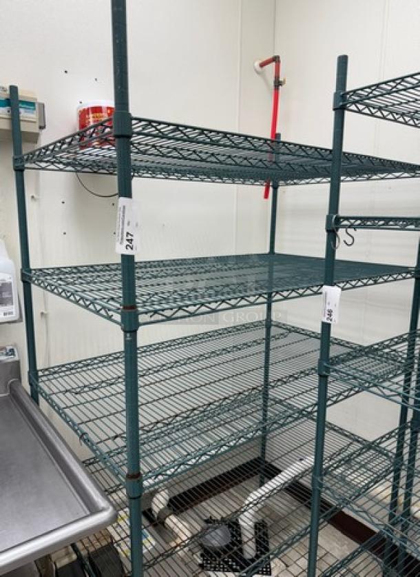 Wire rack with 4 shelves, metal construction, sturdy condition, ideal for storage. Tags indicate item number 27.