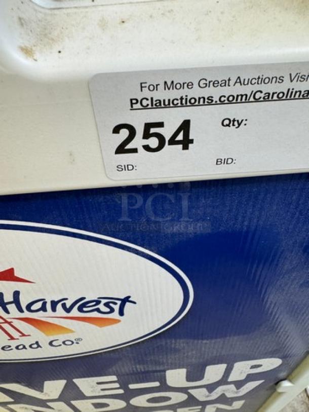 Signicade Customizable Deluxe Portable Advertising Sign, showing Harvest Bread Co logo and auction tag indicating lot 254.