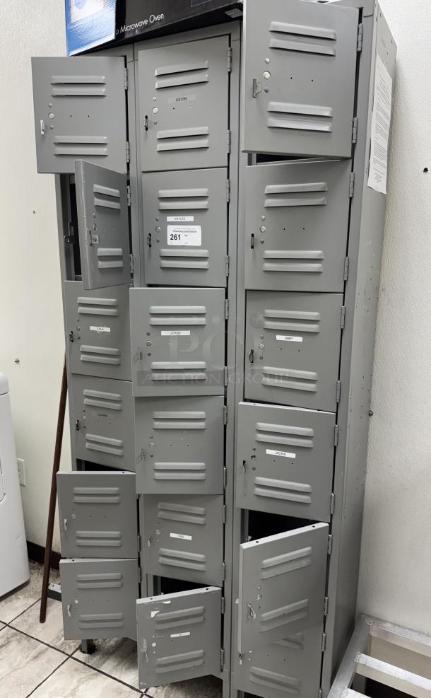 Gray 18-cubbie employee locker with multiple open doors, labeled with names and number tags. Some wear visible.