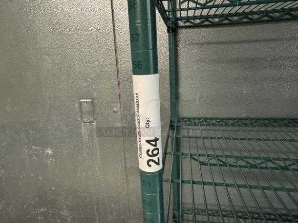 Wire rack with 4 shelves, in good condition. Features adjustable metal shelving. Auction tag reads "264 Qty."