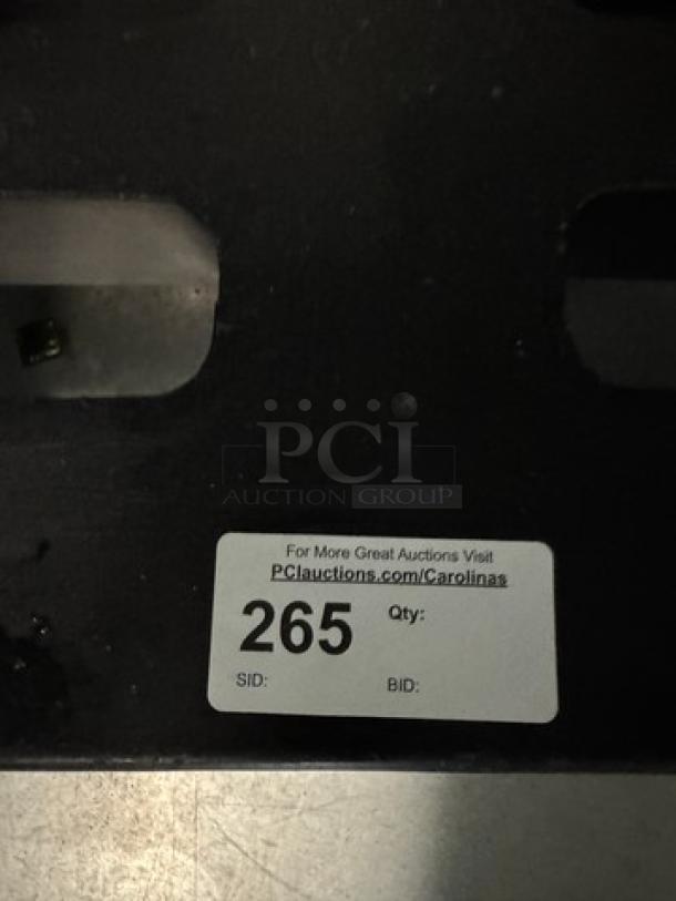 Metal Dunnage Rack with auction label reading "265." Visit PCAuctions.com/Carolinas for more details.