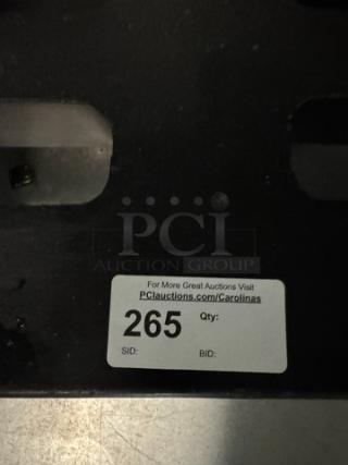 Metal Dunnage Rack with auction label reading "265." Visit PCAuctions.com/Carolinas for more details.