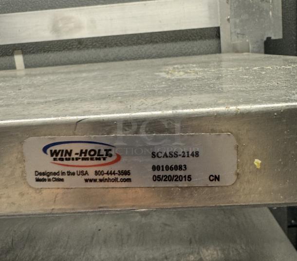 Winholt Metal Rack, Model SCASS-2148; four shelves, metal, tag indicates design in USA, made in China, dated 05/20/2015.