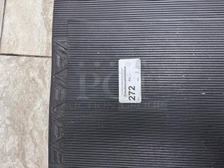 Black floor mats with ribbed texture, set of four. Tag indicates quantity as 4 and a lot number 272. Mats are in good condition.