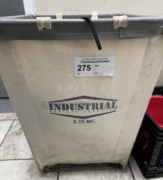 Commercial linen basket, Industrial Seville Classics, 2.75 BU capacity, canvas with metal frame, auction label attached.
