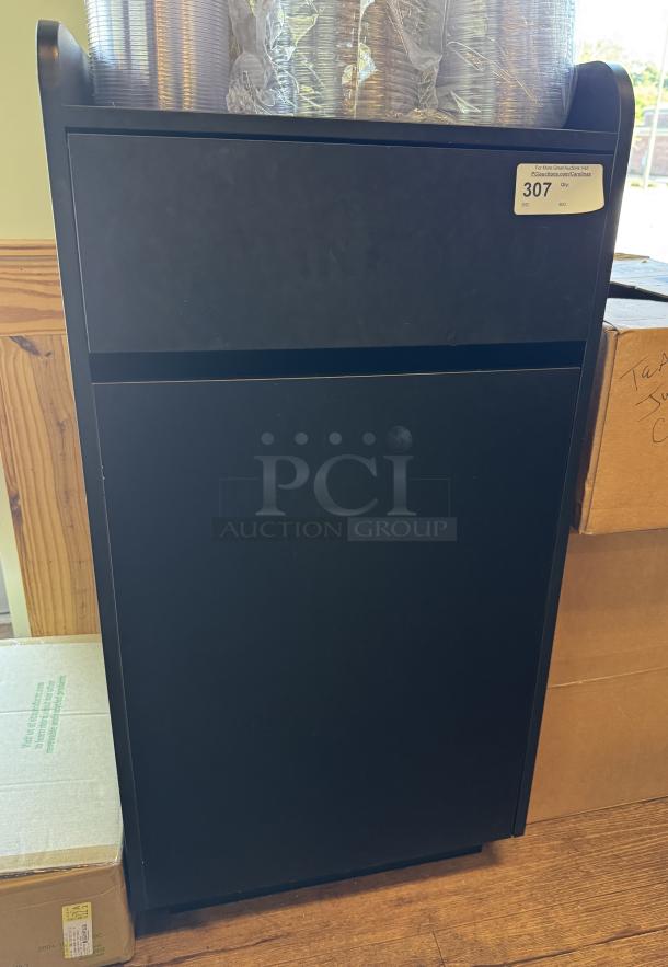 Black trash can bin, rectangular, in good condition, auction tag "307" visible on top.