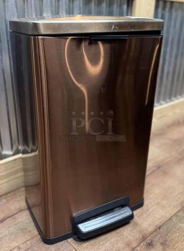 Tramontina trash can, copper finish, foot pedal, rectangular, stainless steel, minor scuffs, suitable for indoor use.