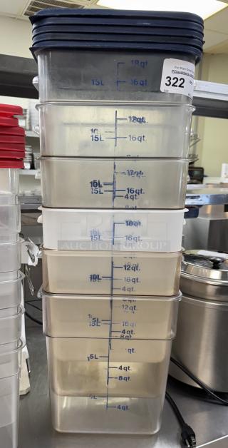 Stack of six 18 qt. square containers with lids, clear with blue measurement markings. Containers labeled up to 18 qt.