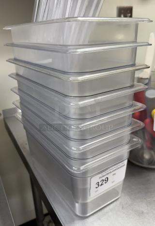 Stack of Virgo Acrylic 1/3 x 6 pans with 5 lids. Clear, sturdy design. Item 329 label visible on bottom pan.