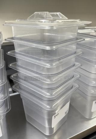 Vigor 1/3 x 6 acrylic pans with lids. Includes six pans and six lids. Clear, stackable design. Brand label visible.