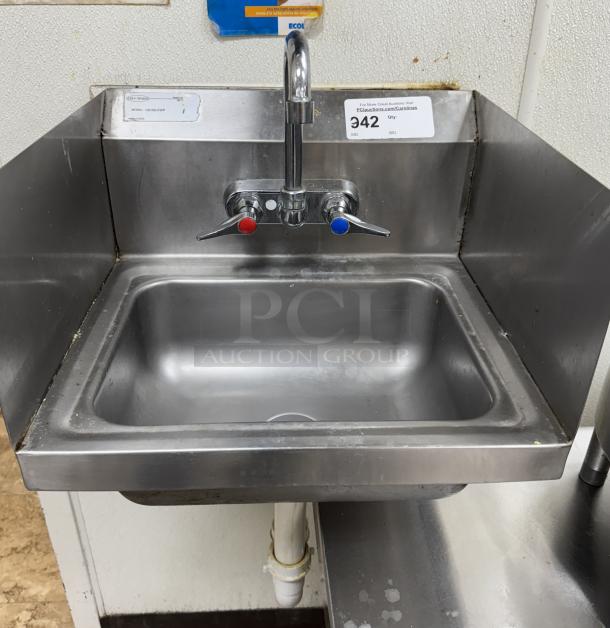 Serv-Ware wall mount hand sink with splash guards, model HS15S-CWP, includes faucet. Visible auction label, good condition.