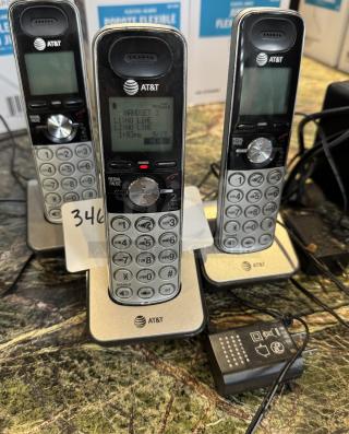 AT&T cordless telephones with bases, set of 3. Features include digital display, keypads, and charging bases. Appears in good condition.