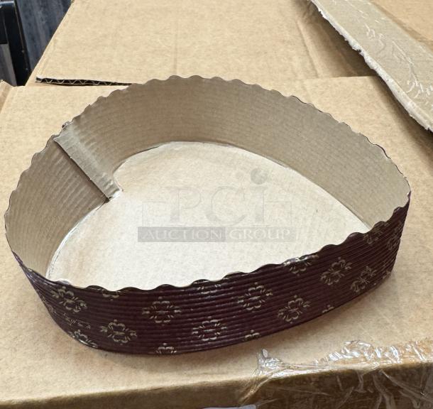 Heart-shaped disposable baking mold with decorative pattern, brown color, made of sturdy paperboard, suitable for baking.