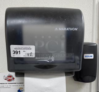 Marathon paper towel dispenser, wall-mounted, motion-activated, with visible auction tag for 2 units, model by Georgia-Pacific.