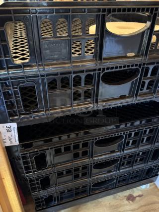 Stacked bakery bread racks with dollie, black plastic, lattice design, label reads "ORBIS Made in USA," set of 10 for auction.