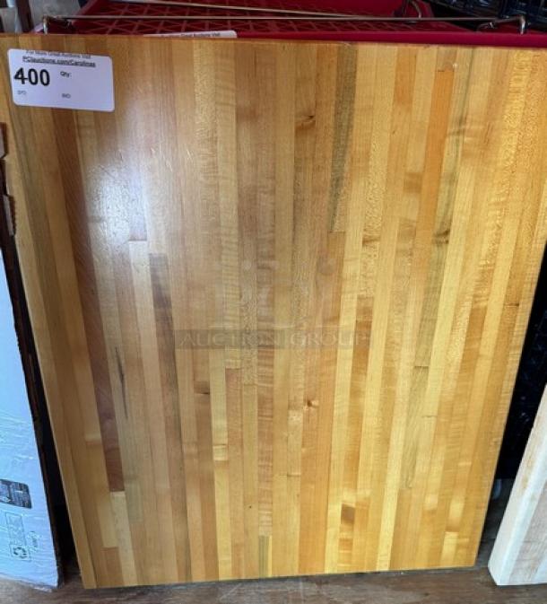 Large wooden cutting board, featuring a striped wood pattern in excellent condition. Label indicates price as 400.