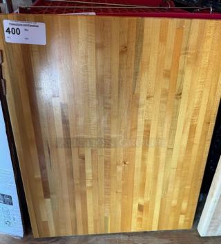Large wooden cutting board, featuring a striped wood pattern in excellent condition. Label indicates price as 400.