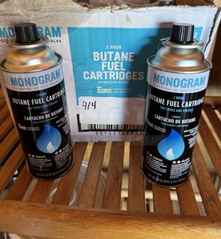Monogram 2-hour butane fuel cartridges for stoves and torches, 10-pack. Includes a box and visible labels; condition appears new.