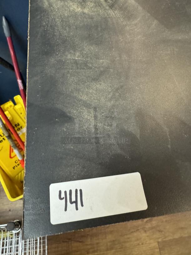 Black display case with slightly worn surface, numbered label "441" attached; ideal for showcasing collectibles.