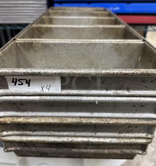 Chicago Metallic 5 loaf bread pan, set of 4, with visible wear and rust. Marked "4565." Tag reads "454 x4."