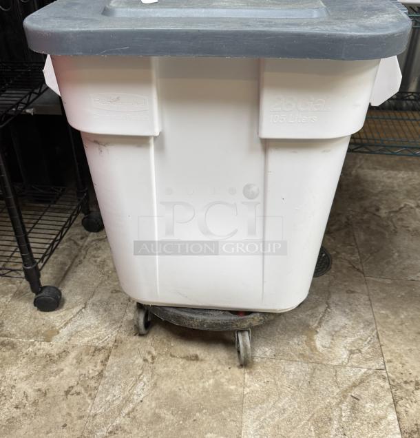 Rubbermaid 28 Gal. dry storage container with dollie, white, lid gray, wheels attached, marked 105 liters. Slight wear visible.