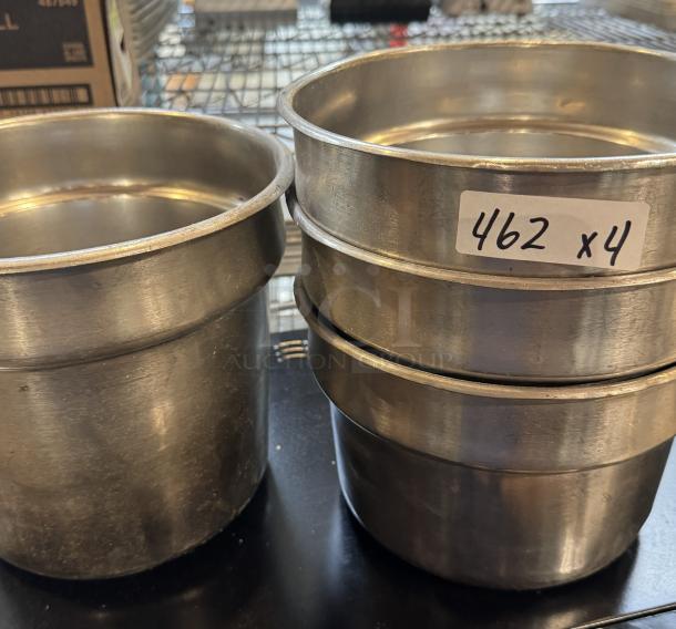 Assorted round insert pans, metal, various sizes, set of 4, used condition, marked "462 x4" on side.