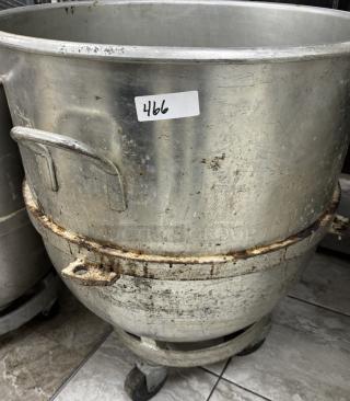 140 Qt. metal mixing bowl with dollie, used condition, some surface wear and rust. Label marked "466".