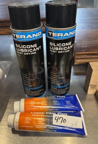 Two Terand silicone lubricant spray cans and two tubes of Lubri-Film Plus sanitary lubricant, labeled "470 x4."