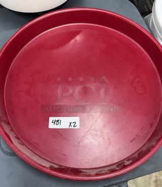 Red 16" serving trays, set of 2. Minimal wear, round design. Tag reads "481 x2".