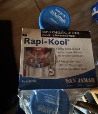 Rapi-Kool Rapid Chilling Utensil by San Jamar in packaging, for cooling soups and stews. Includes NSF certification marking.