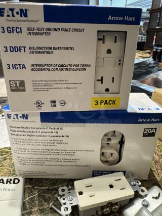 Eaton Arrow Hart receptacle covers, 4 new boxes, GFCI and duplex models, self-test feature, UL listed, 20A, chemical-resistant.