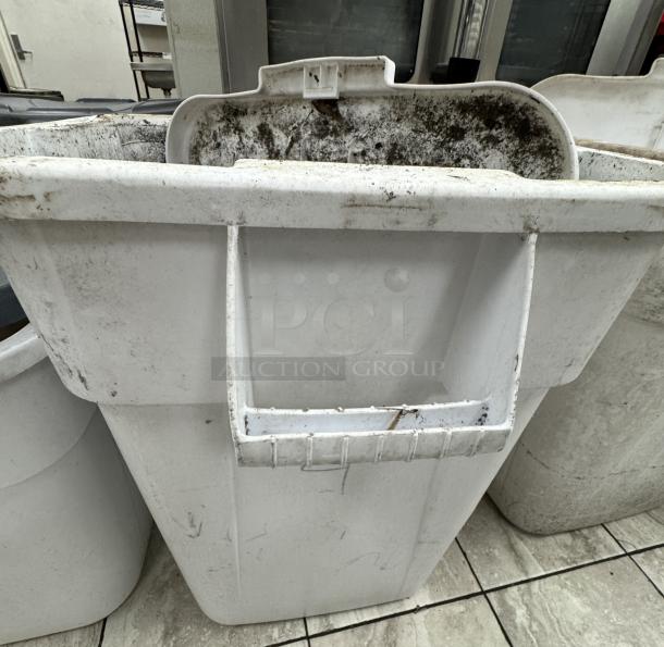 Rubbermaid 40 Gal dry storage container, white, heavily stained and worn, featuring a large front handle for ease of use.