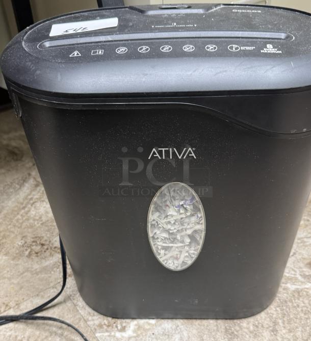 Ativa 08CC03 paper shredder, black, visible shredded paper, minor wear, eight-sheet capacity label.