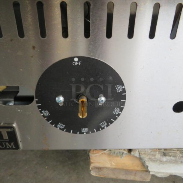 Patriot PT-G36-T griddle, natural gas, thermostat-controlled, 36x28x16 inches, missing 3 knobs, used condition.