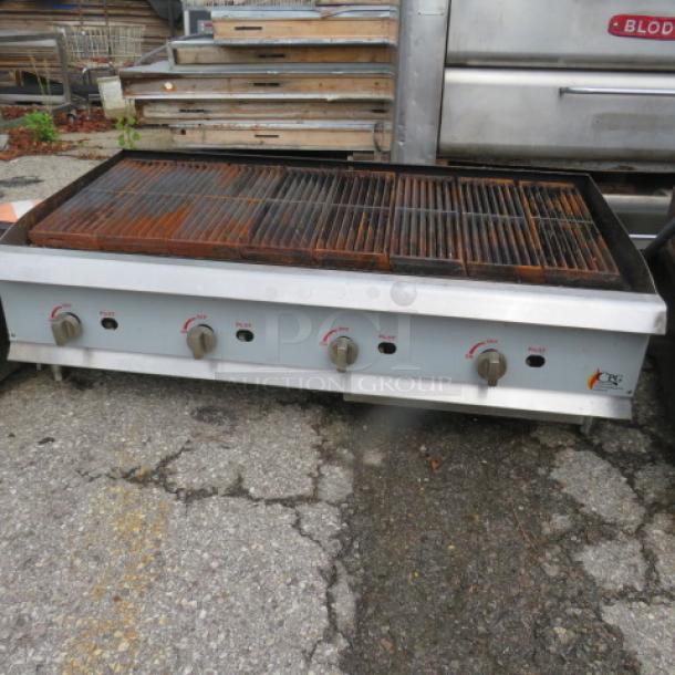 CPG Natural Gas Charbroiler, Model CRCPG48NL, 48x27x16 inches. Features five control knobs, used condition.