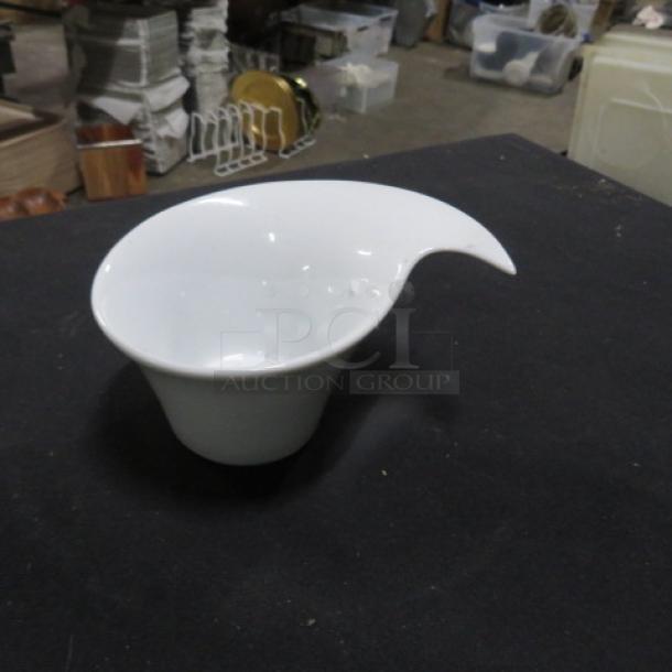 Pier One serving bowl, white, unique wave design, excellent condition. No visible markings or tags. Perfect for decor.