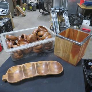 Lot of wooden bowls and holders, featuring smooth finish, includes a large rectangular holder and a multi-section tray.