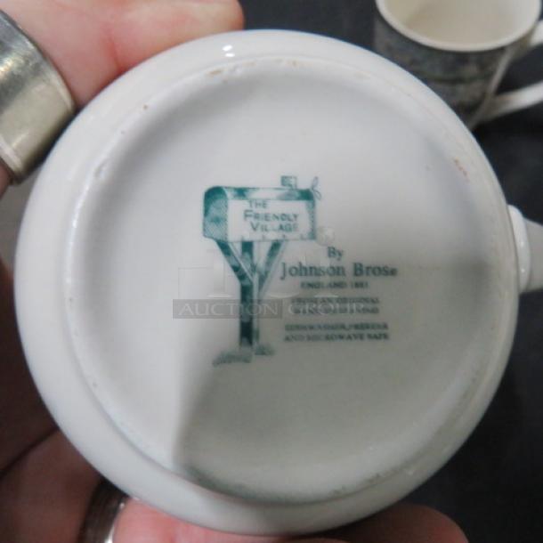 Collectible coffee cup by Johnson Bros, "The Friendly Village" design. England, 1883. Oven, freezer, and microwave safe.