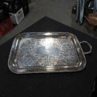 Silver plate tray, 20.5x3 inches, ornate design, rectangular with handles, reflective surface, good condition.