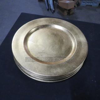 Gold charger plates, set of 5, round, metallic finish, good condition, ideal for elegant table settings.