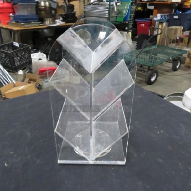 Clear acrylic poly holder with six compartments, in used condition. Suitable for organizing papers or brochures.