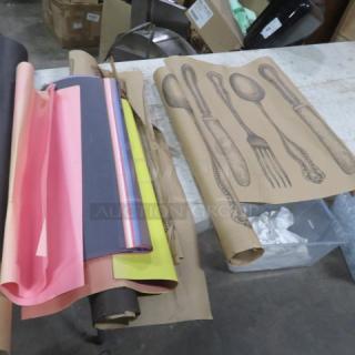 One lot of miscellaneous paper rolls with colorful graphic designs and vintage cutlery illustrations; condition varies.