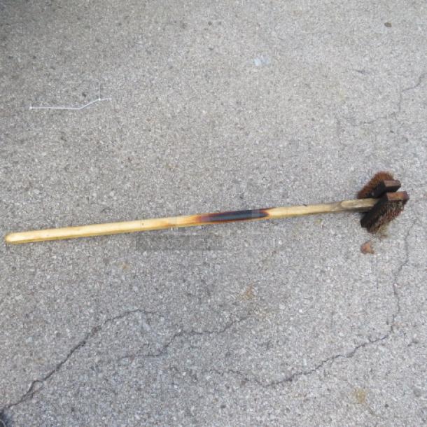 Wooden handle double-sided oven brush, fair condition, dual wire bristles, slight wear, ideal for heavy-duty cleaning.