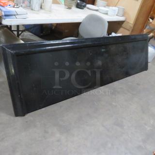 Wooden portable bar top, painted black, dimensions 102x27 inches, good condition with minor wear.