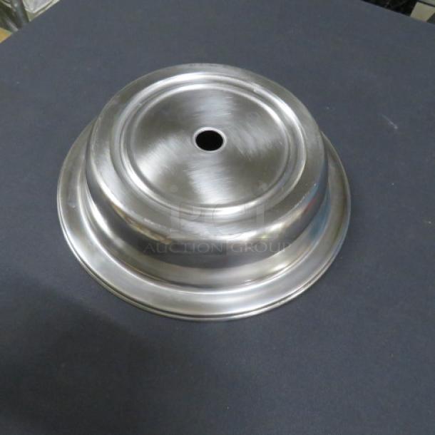 10.5 Inch stainless steel plate cover, model 10XBID, featuring a central hole, in good condition.