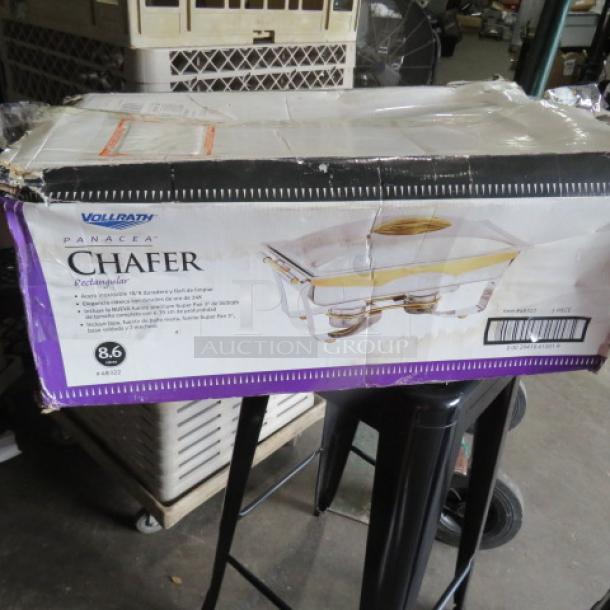 Vollrath Panacea 9 qt stainless steel chafer, model 48322, new in damaged box. Features 24 kt gold accents.