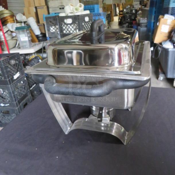 Vollrath 4.1 Quart Dakota Half Size Chafer Set, Model 99870, stainless steel, new condition with black handles.