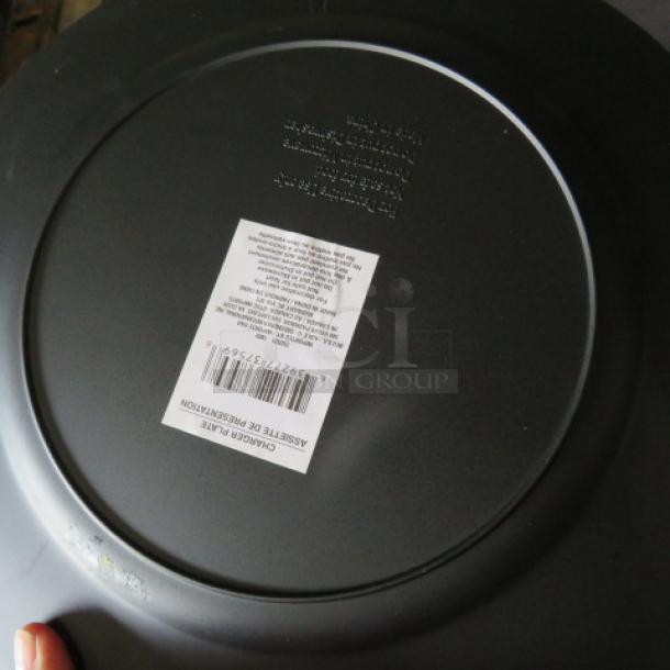 New 13-inch round silver charger plate, brand 10XBID, shown with factory label and barcode, in mint condition.